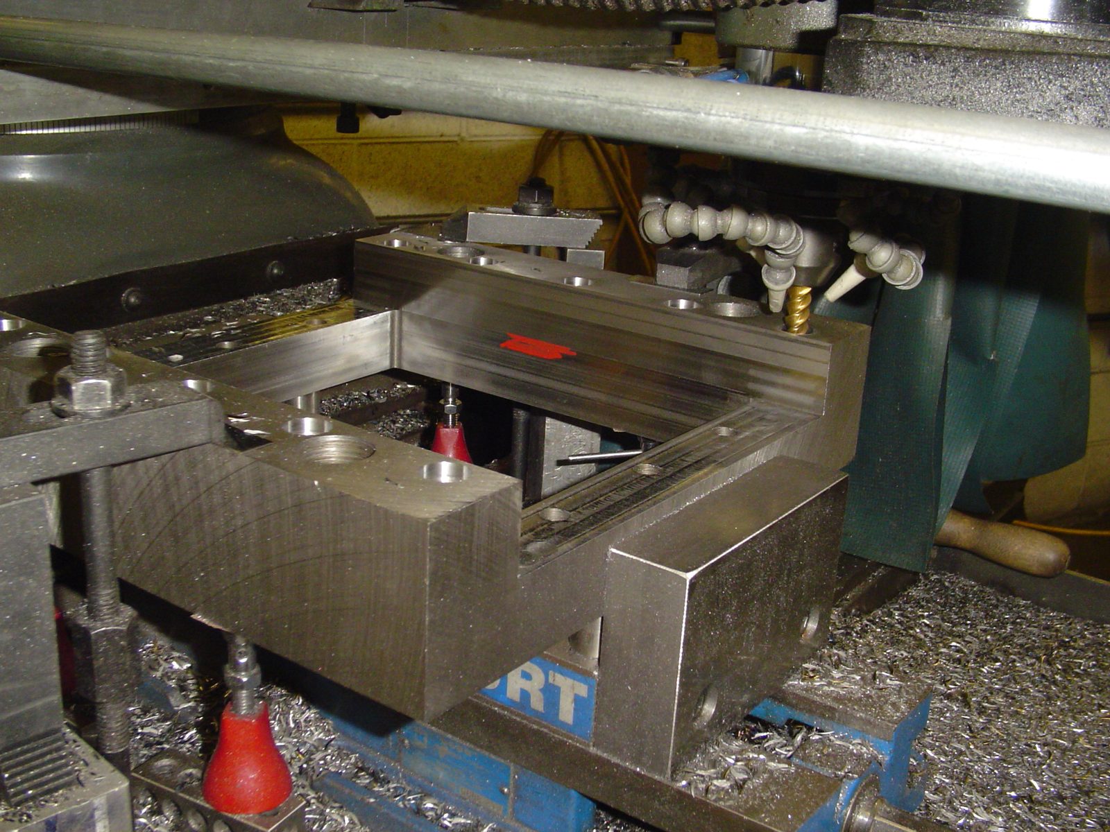 Extrusion die block being machined